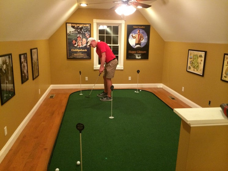 large indoor putting green in home